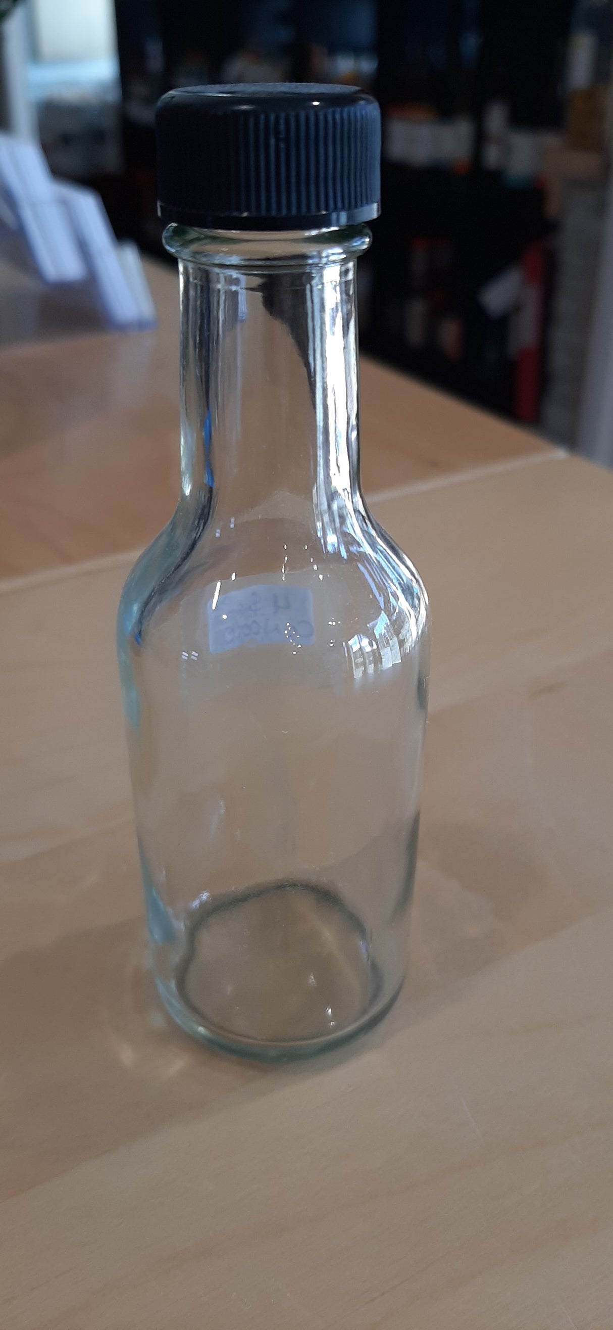 CON0010 - Petite bouteille en verre transparent