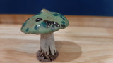 MUS0075 - Petit champignon vert tacheté